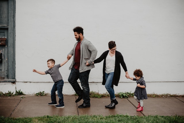 family holding hands in a line