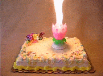 an elaborately-lit birthday cake