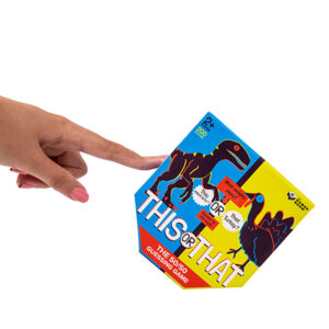 This or That game box, being pushed to one side