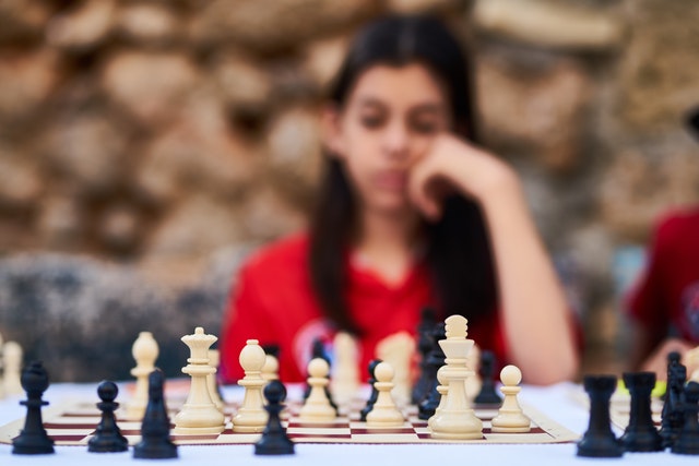 Child playing chess