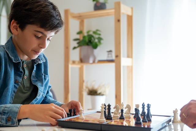 Child playing chess
