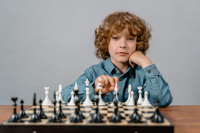 Child playing chess