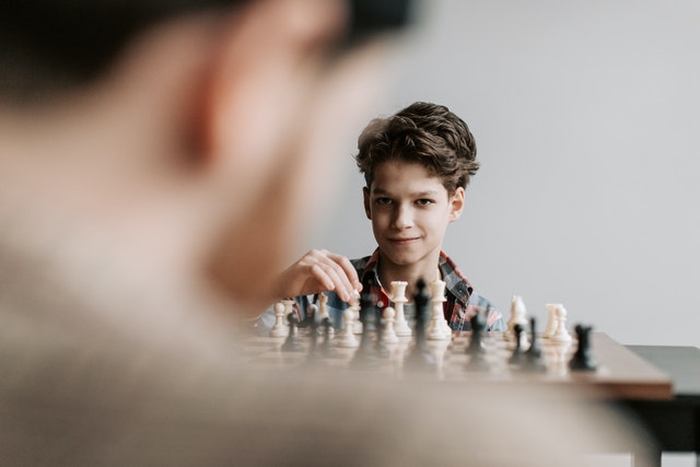 Child playing chess
