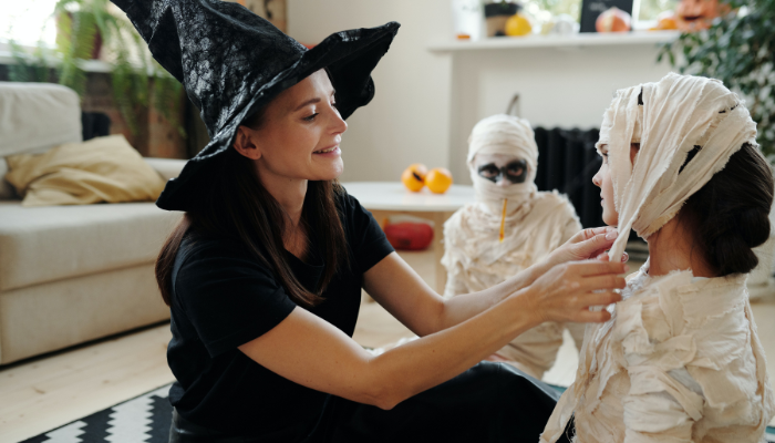 Mummy helping with DIY Halloween Costumes