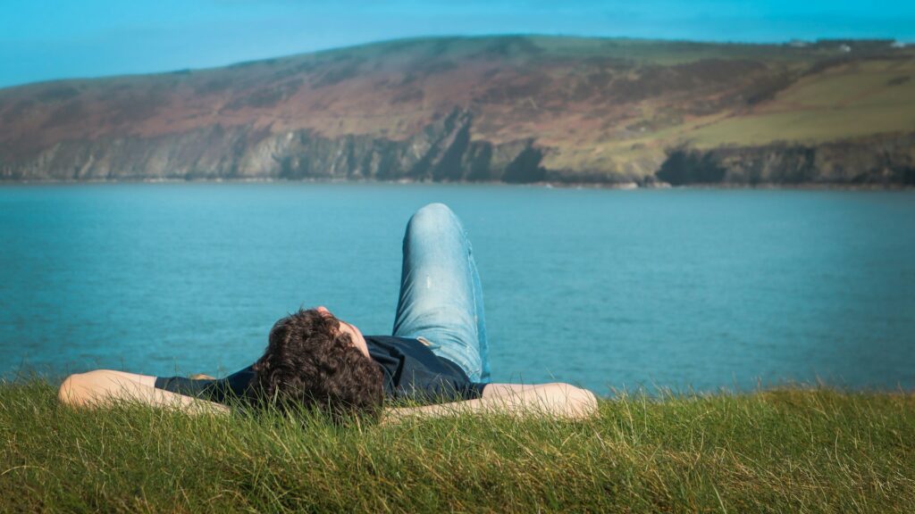 Man laying in field